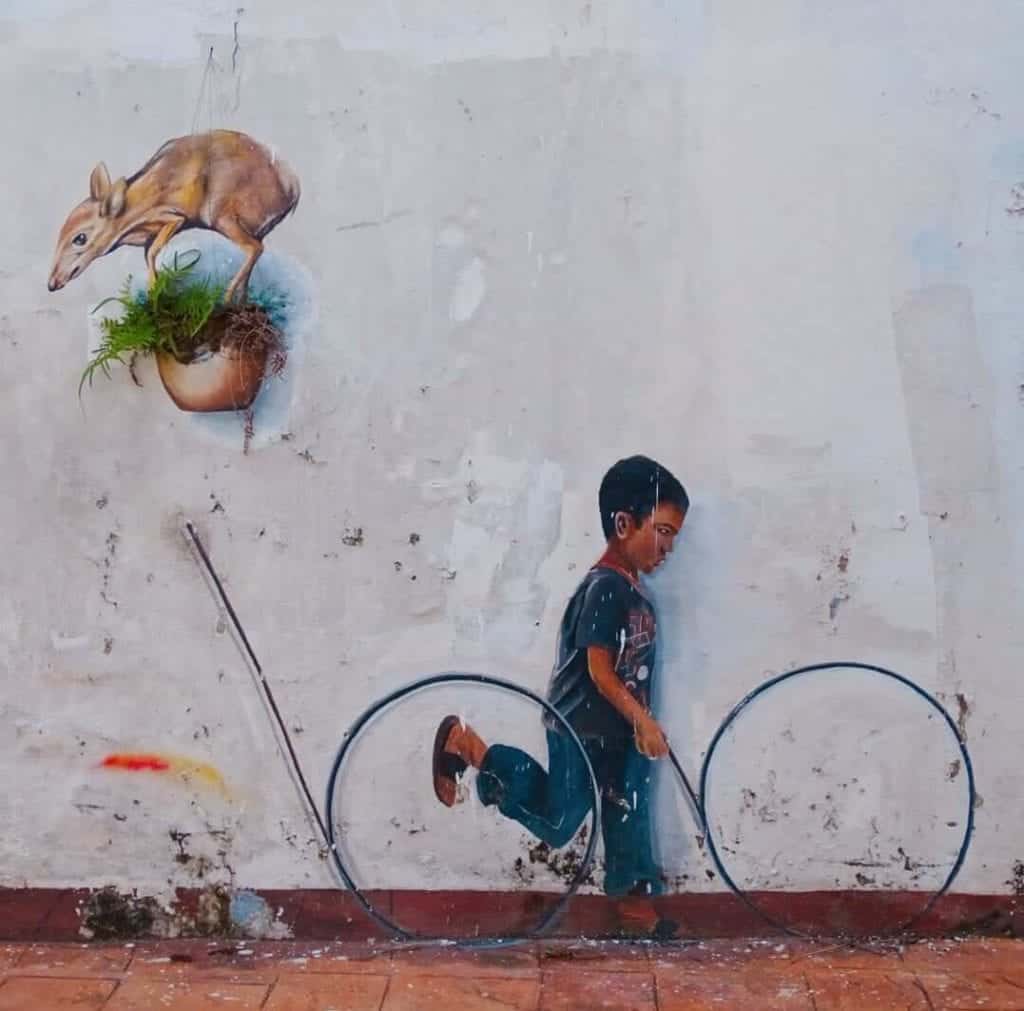 Street art of a child in Melaka