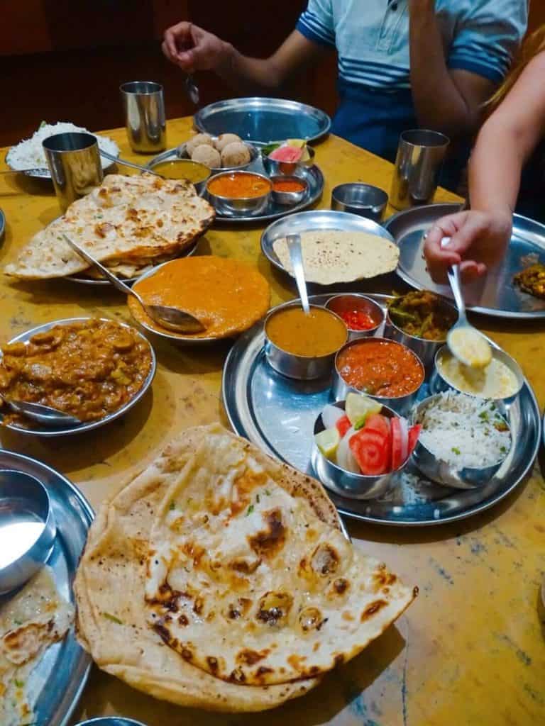 Spread of Indian food at Rajasthani Restaurant Rishikesh