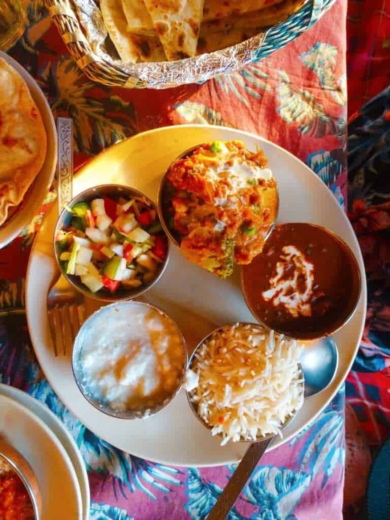 Plate of thali dishes Ganga Beach Cafe Rishikesh